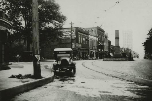 In the beginning, Greenville’s dual libraries were both housed in rented rooms in the downtown area. It was a boom time for the city. World War I had just ended, the city was witnessing growth in the great textile mills and their villages, streets were being paved, and an electric trolley system circled the town. (Image from the South Carolina Room Collection)