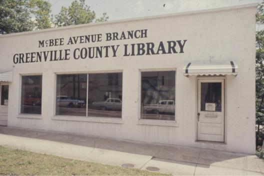 By the 1950s, the demand for a new library resulted in the establishment of a re-purposed commercial building on McBee Avenue. (Image from the South Carolina Room Collection)
